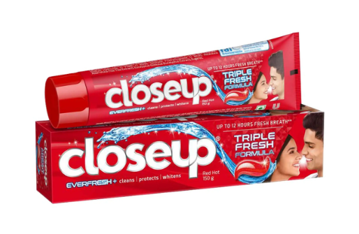 closeup triple fresh formula anti-germ gel toothpaste red hot